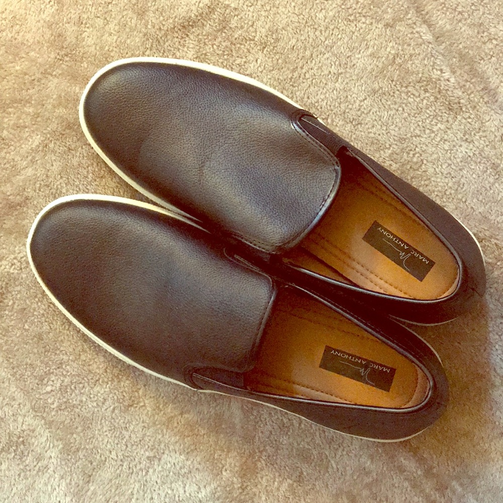 Men’s black slip on boat shoe by Marc Anthony
